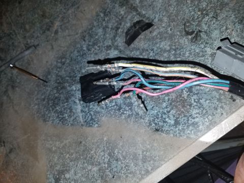 1994 Ford Bronco - Photograph of an automotive wiring harness with exposed crimp terminals, not a document.