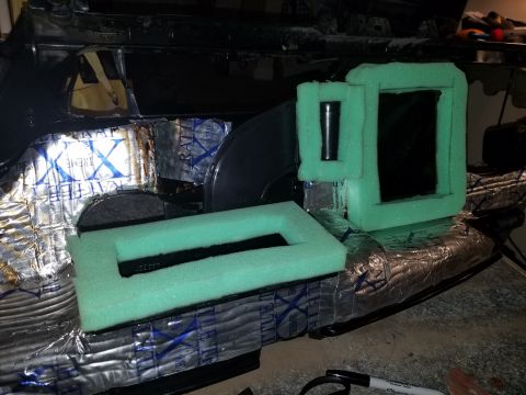 1994 Ford Bronco - Photograph of foam baffles and sound-deadening material in a vehicle, not a document.