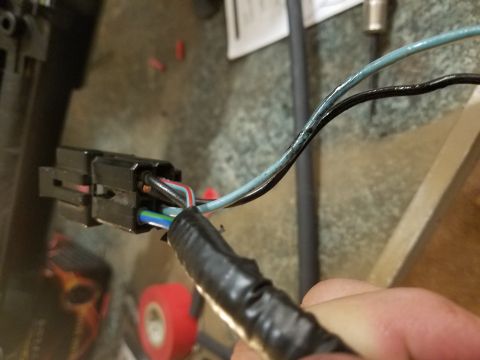1994 Ford Bronco - Photograph of a hand-held electrical connector and wiring, not a diagram.
