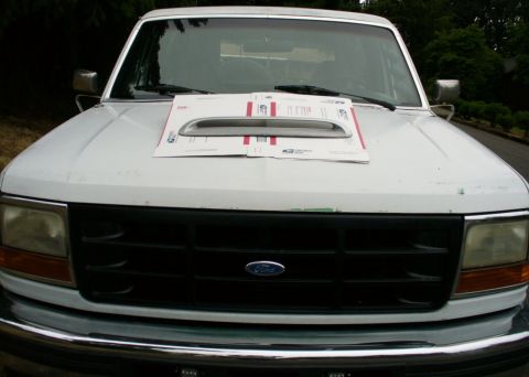 1992 Ford Bronco - Subaru hood scoop, placement with template for better slope visual.