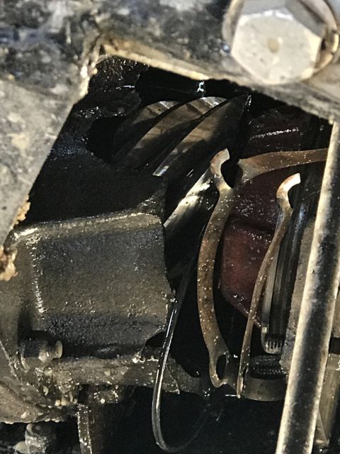 1989 Ford Bronco - Engine internals showing gears and metal parts, likely in need of maintenance.