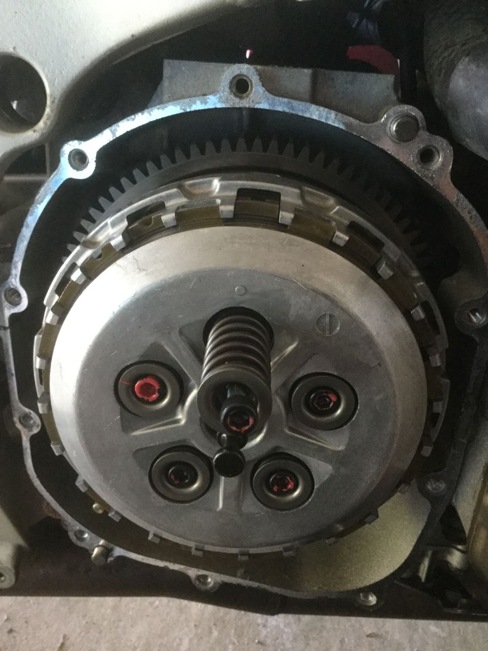 motorcycle clutch assembly with springs and bolts