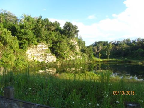 1989 Ford Bronco - A tranquil natural scene with a lake and cliff face, captured on September 19, 2015.