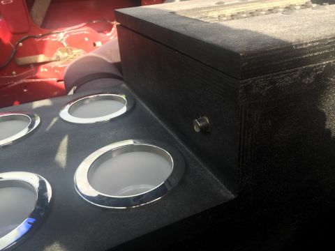 1989 Ford Bronco - Custom center console with gauge pods and storage box in a vehicle interior.