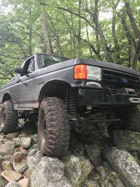 1989 Ford Bronco - This modified 1989 Ford Bronco is navigating a rocky trail.
