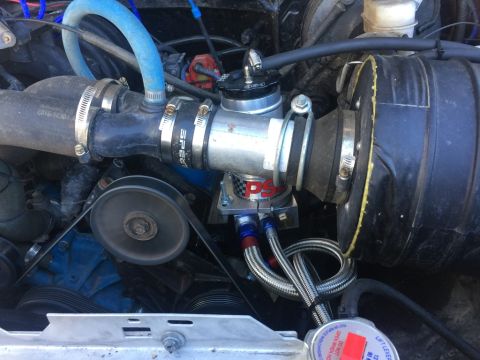 1989 Ford Bronco - Close-up view of engine components, including intake and blow-off valve, with visible branding on-screen text from a watermark.