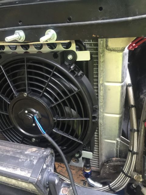 1989 Ford Bronco - Aftermarket radiator fan and cooling system components are visible in this close-up view.