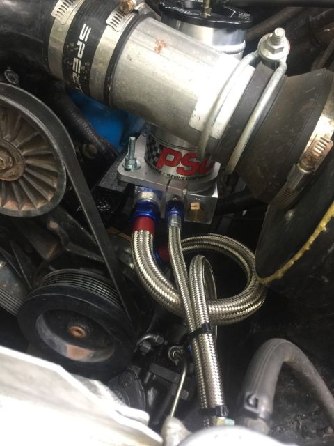 1989 Ford Bronco - Close-up of engine components, including a PSC power steering pump and Spectre intake hose.