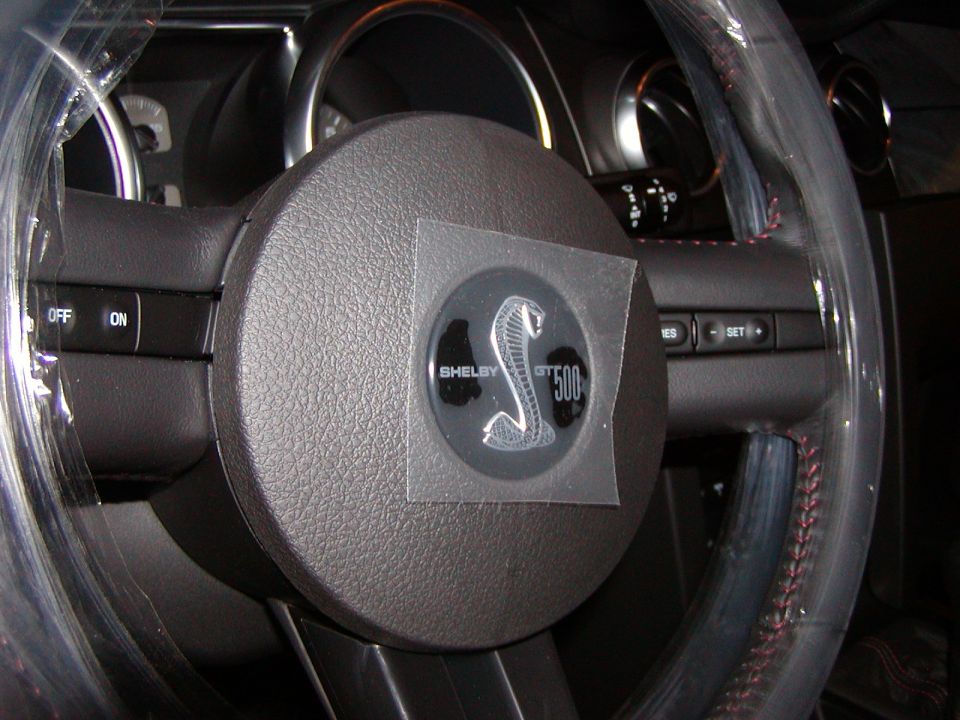 Shelby GT500 Mustang steering wheel with protective plastic film and Cobra logo
