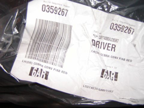 2007 Ford Mustang - The image shows packaging for a vehicle part, not the vehicle itself.