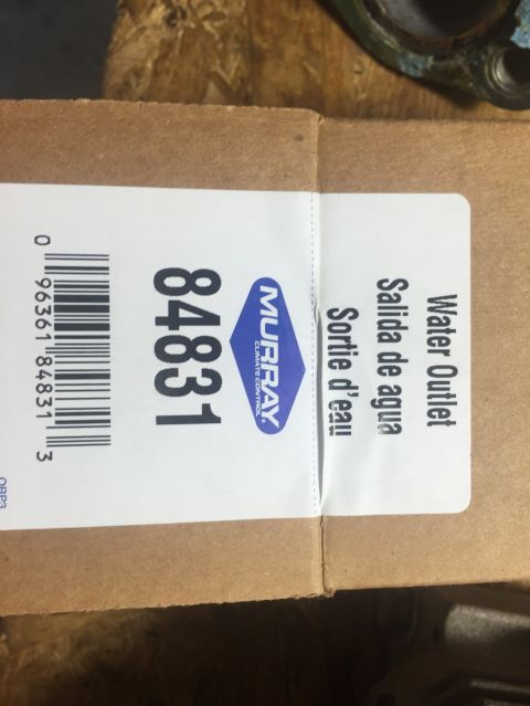 1989 Ford Bronco - Box for a vehicle part, showing a part number and a logo.