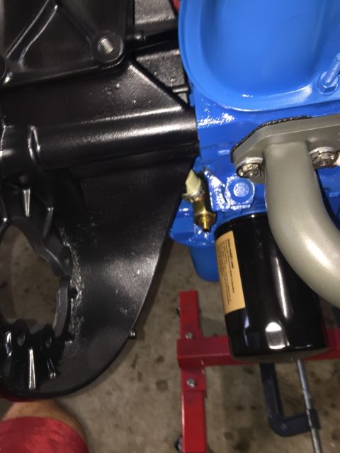 1989 Ford Bronco - Engine components including block, oil filter, and exhaust manifold are visible.