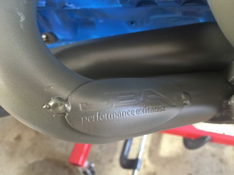 1989 Ford Bronco - Close-up of a JBA performance exhaust header, showing the brand logo.