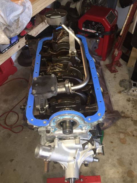 1989 Ford Bronco - Engine block assembly with a new blue oil pan gasket fitted, ready for further work.