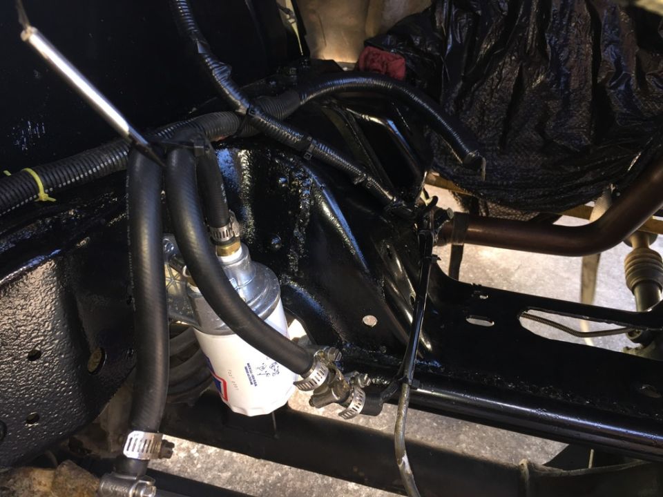 Engine bay fuel filter with hoses and wiring