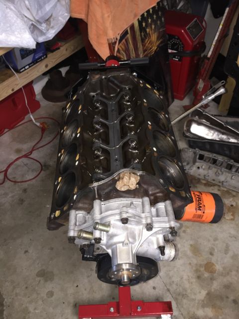 1989 Ford Bronco - An engine block is mounted on a stand, ready for assembly or repair.