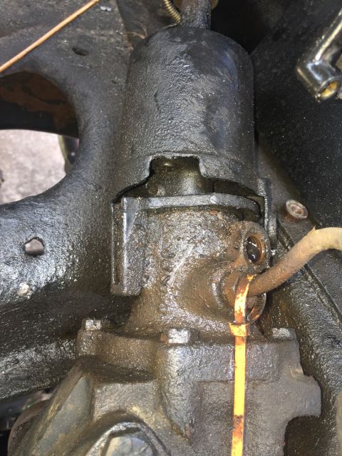 1989 Ford Bronco - Close-up view of a greasy steering gear assembly, possibly from an older vehicle.
