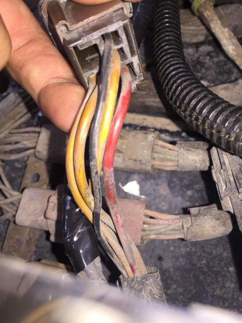 1989 Ford Bronco - Electrical connectors and wiring harness detail, some wires are taped.