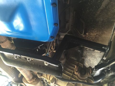 1989 Ford Bronco - Custom transmission crossmember modification shown with a blue oil pan.