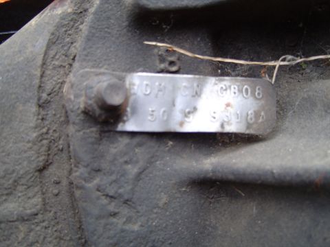 1989 Ford Bronco - Close-up of a differential housing with a metal identification tag.