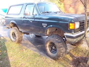 1989 Ford Bronco - Lifted 1989 Ford Bronco with large off-road tires.