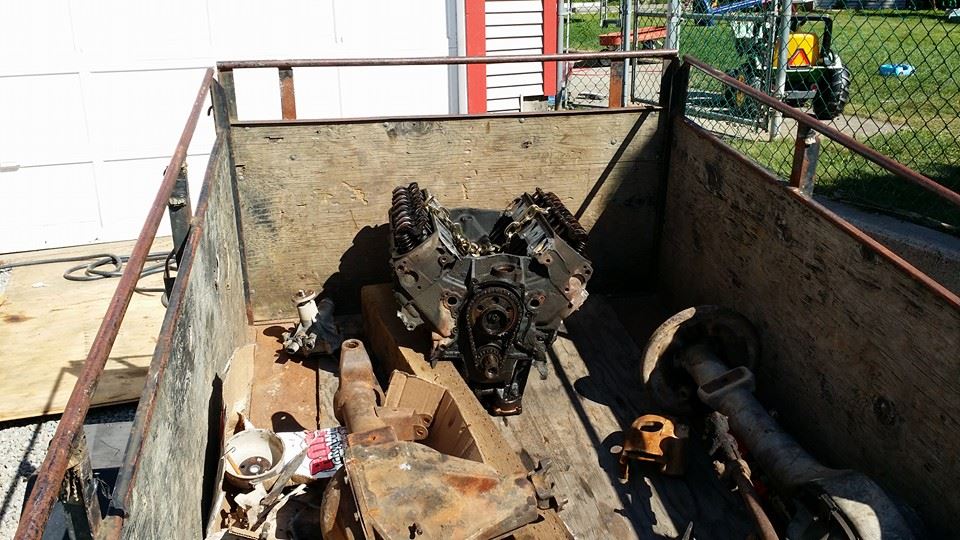 V8 engine in a trailer with other parts