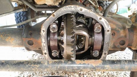 1984 Ford Bronco - Close-up view of the internal gears within a vehicle's differential housing.