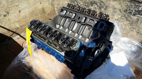 1984 Ford Bronco - Close-up of a V8 engine block, showing the cylinder heads and valve train.