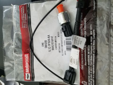 1994 Ford Bronco - A Motorcraft brake repair kit is shown, containing a sensor and wiring harness.
