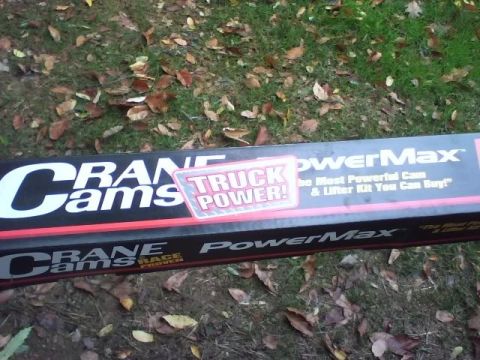 1989 Ford Bronco - A box for Crane Cams PowerMax is shown on the ground with fallen leaves.