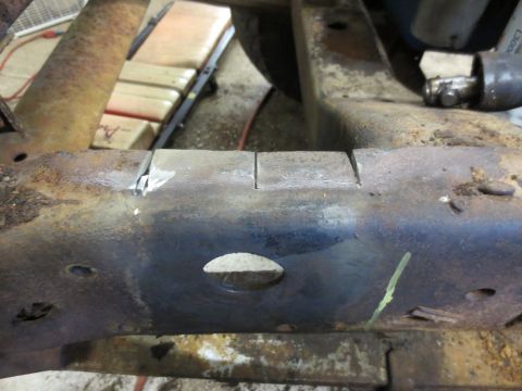 1967 Ford F-250 - Truck frame section with two parallel cuts, likely for modification or repair.