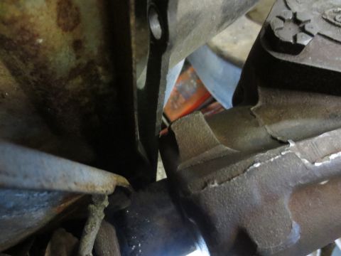 1967 Ford F-250 - Close-up view of worn and corroded vehicle steering and suspension components.