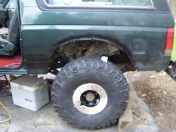 1989 Ford Bronco - Close-up of the rear fender and wheel well of a 1989 Ford Bronco.