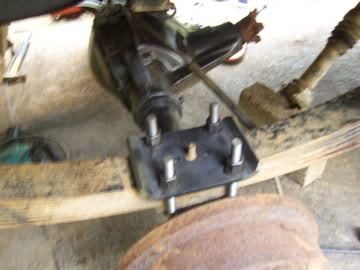 1989 Ford Bronco - Close-up view of a vehicle's rear axle assembly, showing suspension components.