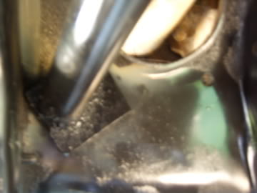 1989 Ford Bronco - A close-up view of a vehicle's interior components, the Supermotors logo at the bottom.