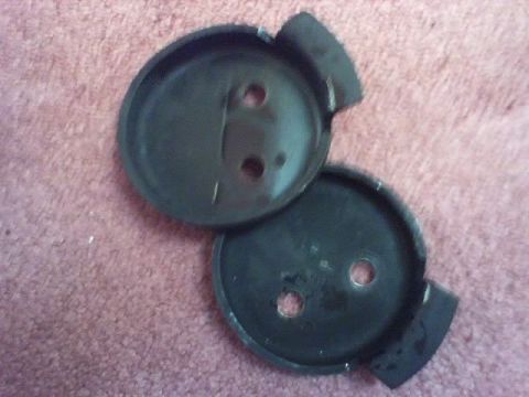 1989 Ford Bronco - Two black circular automotive parts are shown, likely for a vehicle's suspension or braking system.