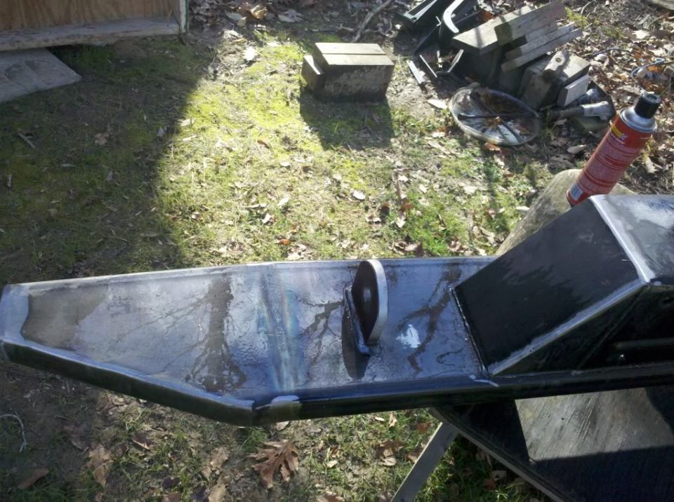 Custom metal bumper with tow hook, outdoors
