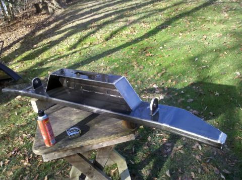 1989 Ford Bronco - Custom steel bumper project shown with tools on a table outdoors.