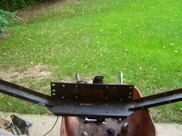 1989 Ford Bronco - A front bumper assembly is shown, likely removed from a vehicle for repair or replacement.