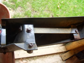 1989 Ford Bronco - Close-up of a vehicle's bumper bracket, with the Supermotors logo in the corner.