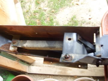 1989 Ford Bronco - Close-up view of a rusted bumper assembly, likely a replacement part.