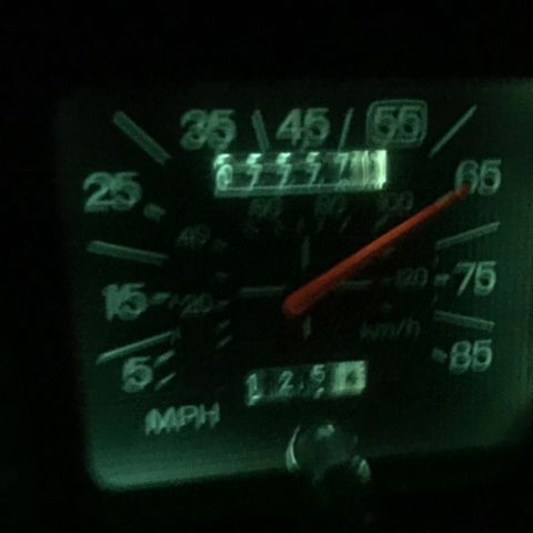 1985 Ford F-350 - Interior view of a vehicle's speedometer and odometer.