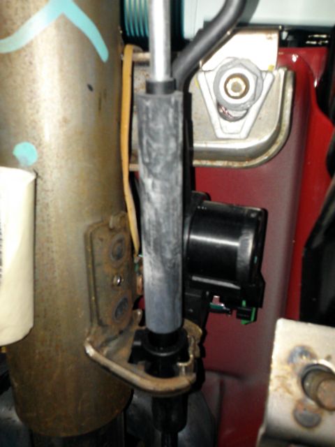 1998 Chevrolet C/K Pickup - Close-up view of a steering column component, likely part of a dash replacement.