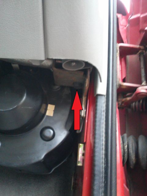 1998 Chevrolet C/K Pickup - Interior door jamb area with a red arrow indicating a specific component.