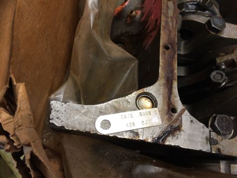 1973 Ford F-100 - Metal engine identification tag stamped C9ZE 6009 C and 428 CJ riveted to a Ford 428 Cobra Jet block.
