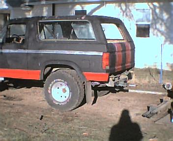 1983 Ford Bronco - This 1983 Ford Bronco is seen from the rear, a two-tone paint scheme and an aftermarket bumper.