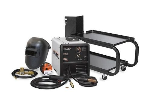 1984 Ford Bronco - Product photo of a MIG welder with welding helmet, leads, wire spool and a rolling steel cart, not a document.