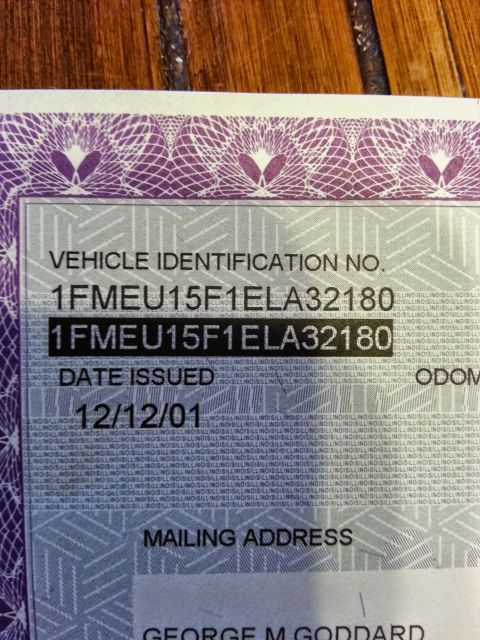 1984 Ford Bronco - Vehicle title/registration document showing the VIN 1FMEU15F1ELA32180, date issued, and owner mailing address.
