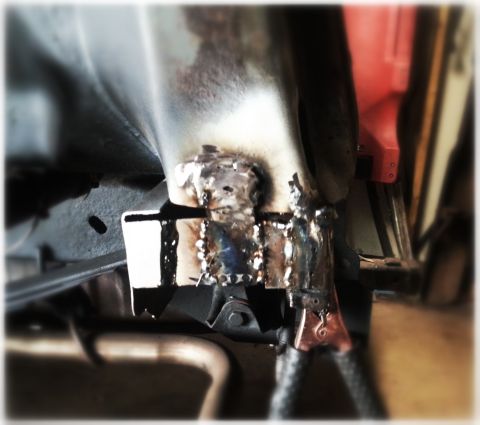 1984 Ford Bronco - This photo shows a section of a vehicle's frame that has undergone welding for repair.