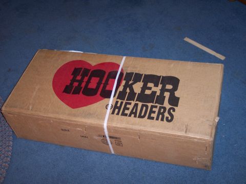1990 Ford Bronco - Box containing Hooker Headers, a performance exhaust part for vehicles.